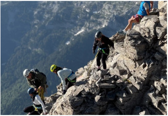 Mountaineers ascending Mount Olympus